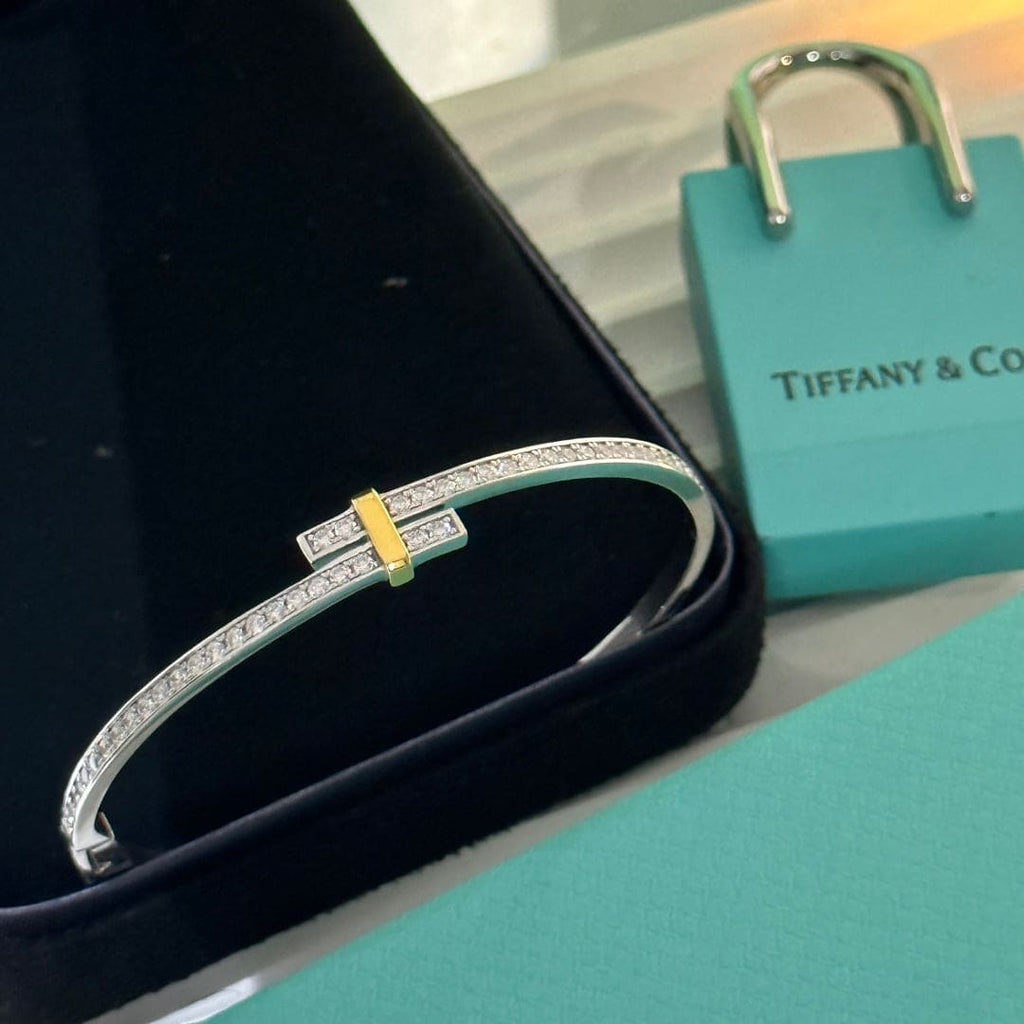 Tiffany Edge Hinged Bypass Bangle 18K Gold Bracelet