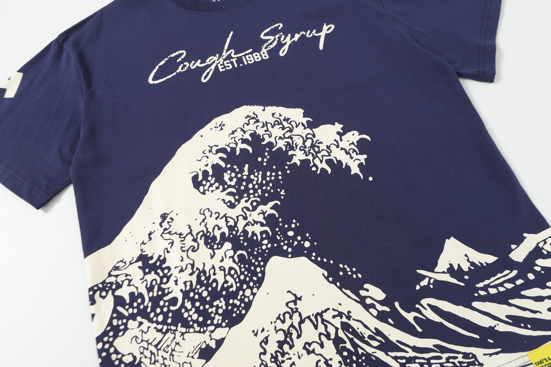 THAT'S A AWFUL LOT OF COUGH SYRUP Wave Graphic Short-Sleeve T-Shirt — detail