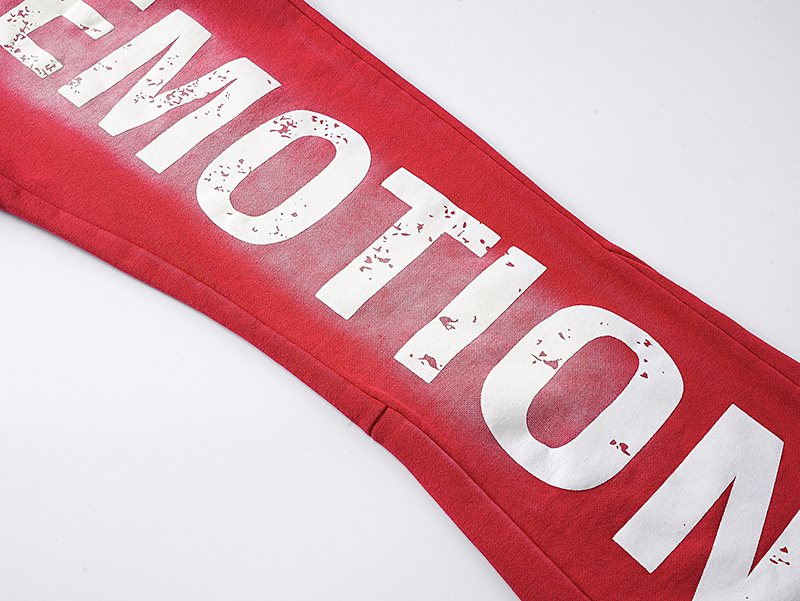 MIXED EMOTION Washed Graphic Flared Pants — detail