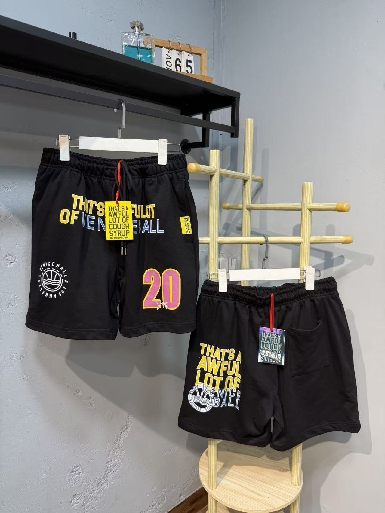 THAT'S A AWFUL LOT OF COUGH SYRUP Number 20 Phrase Graphic Shorts — front